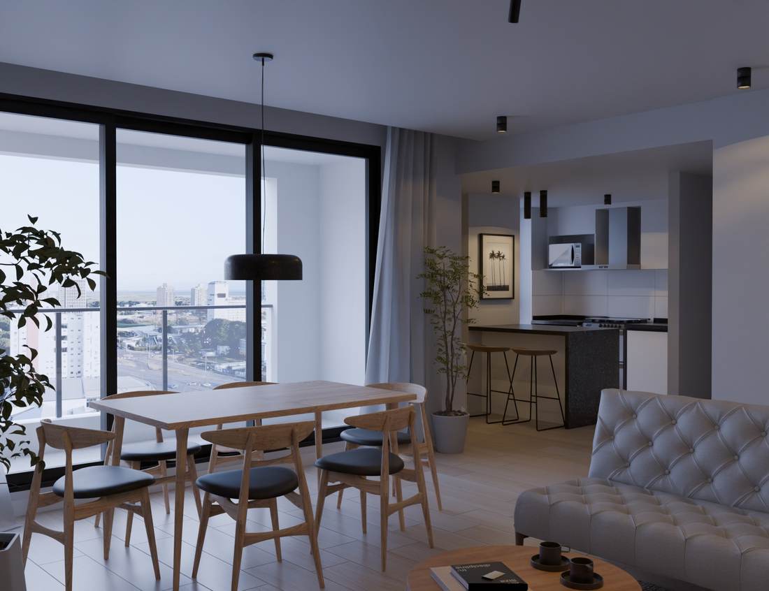 Comedor con ventanal y cocina al fondo